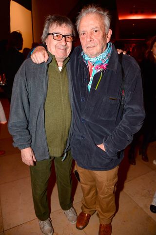 Bill Wyman and David Bailey cosy up at his Stardust Exhibition