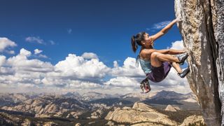 Woman rock climbing