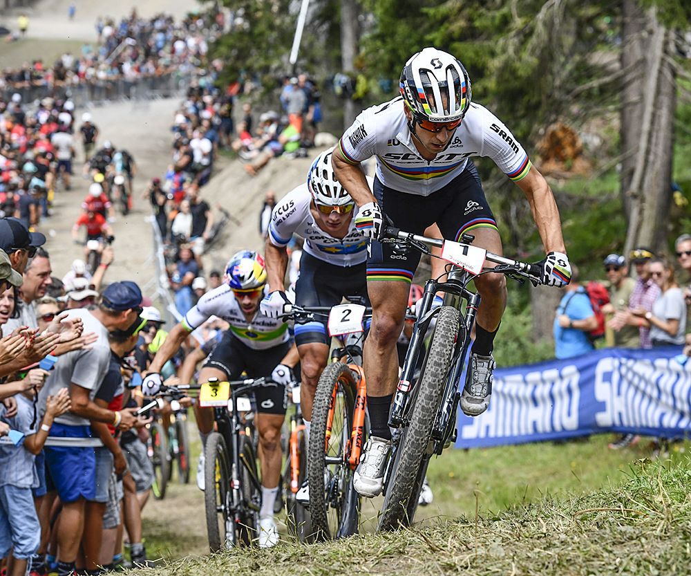 Nino Schurter leading Mathieu van der Poel (Corendon-Circus) and Henrique Avancini (Cannondale Factory Racing)