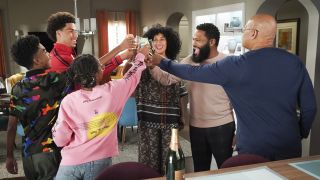 The johnson family cheers with drinks on black-ish