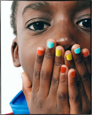 Child wearing Zara Beauty Mini Artists nail polishes in multiple colours