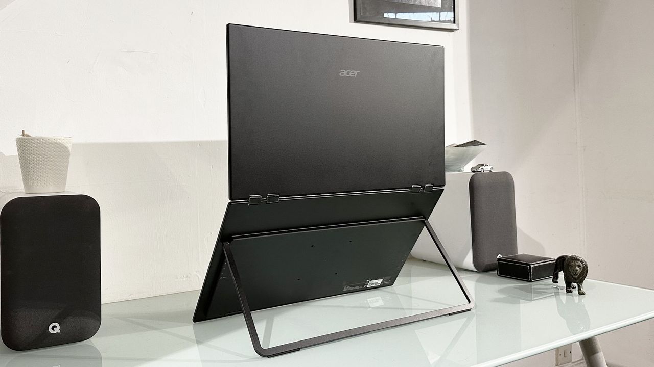 The Acer PD243Y E portable monitor in a home office during our testing