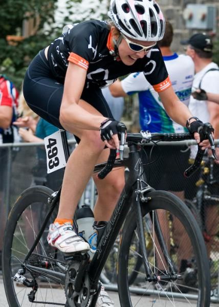 Laurel Larson (XO Communications) goes for points on the Manayunk Wall