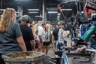 The ListenTALK communication system by Ampetronic | Listen Technologies helped Jasper Engines offset the challenges of conducting tours in a noise-filled manufacturing environment.