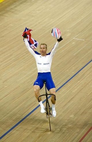 Chris Hoy celebrating a keirin gold at the Olympic Games.