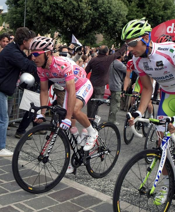 Joaquim Rodriguez (Katusha) and Damiano Caruso (Liquigas-Cannondale) roll off the start line.
