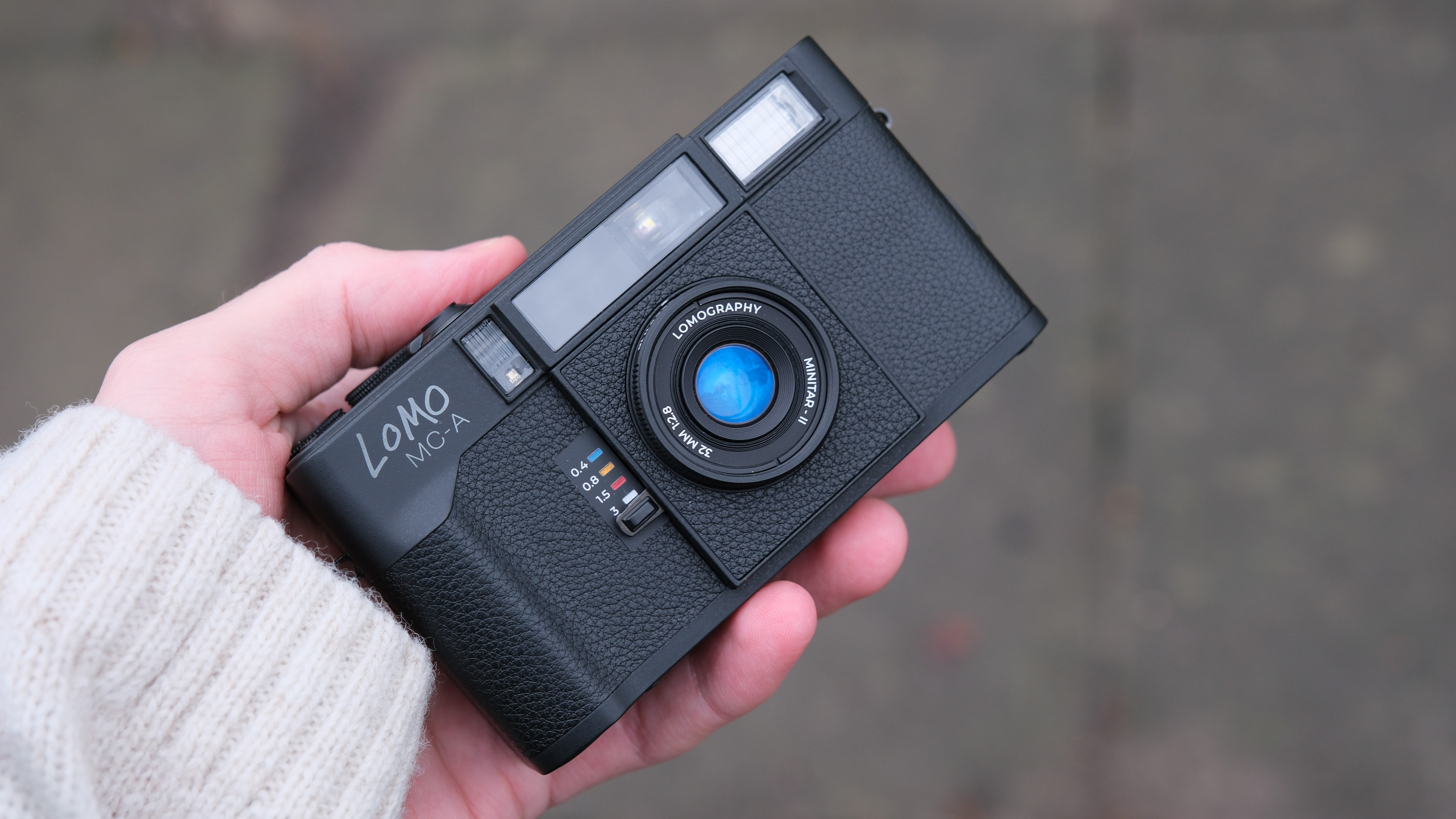 Lomography Lomo MC-A camera held in a hand