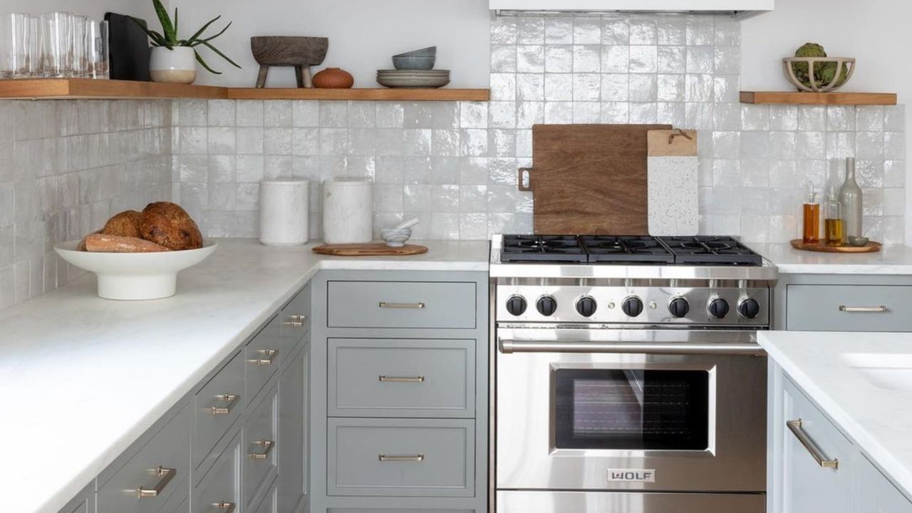 Neutral kitchen with open shelving and white countertops