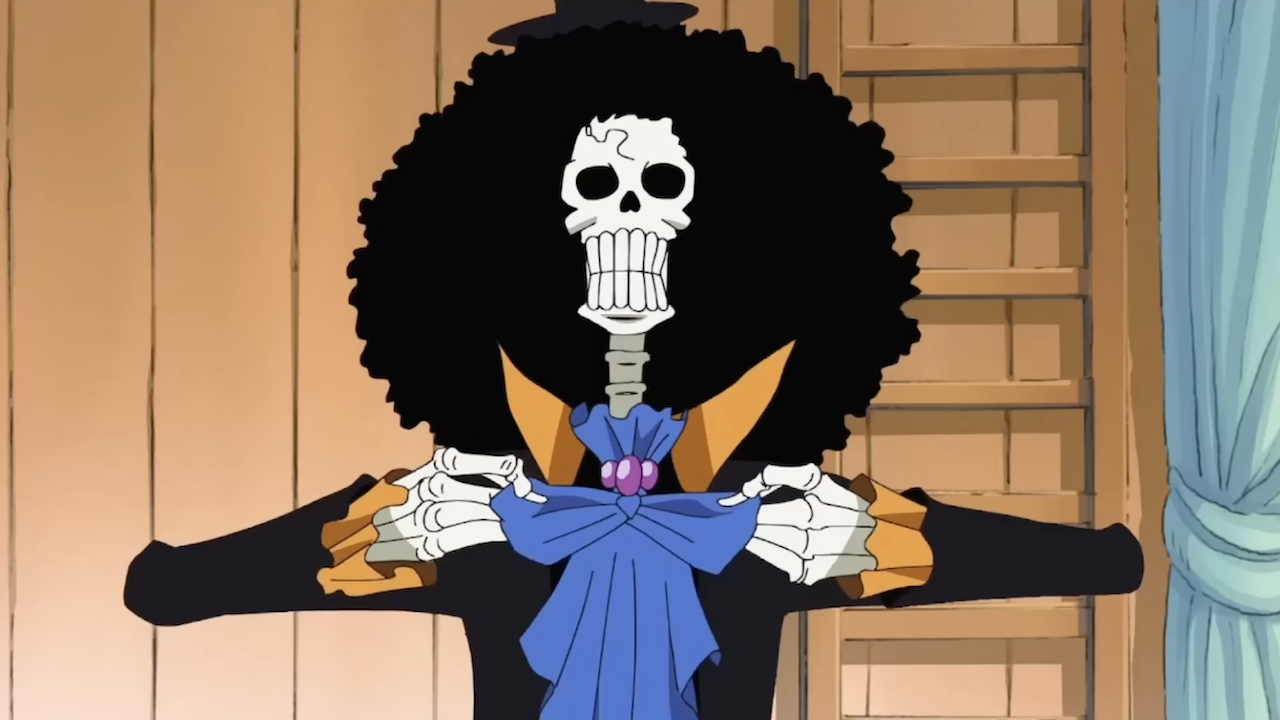 Brook the skeleton seated at the Straw Hats&#039; dining room table in One Piece anime