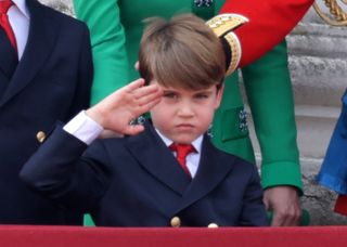 Prince Louis saluting on the balcony of Buckingham Palace at Trooping the Colour