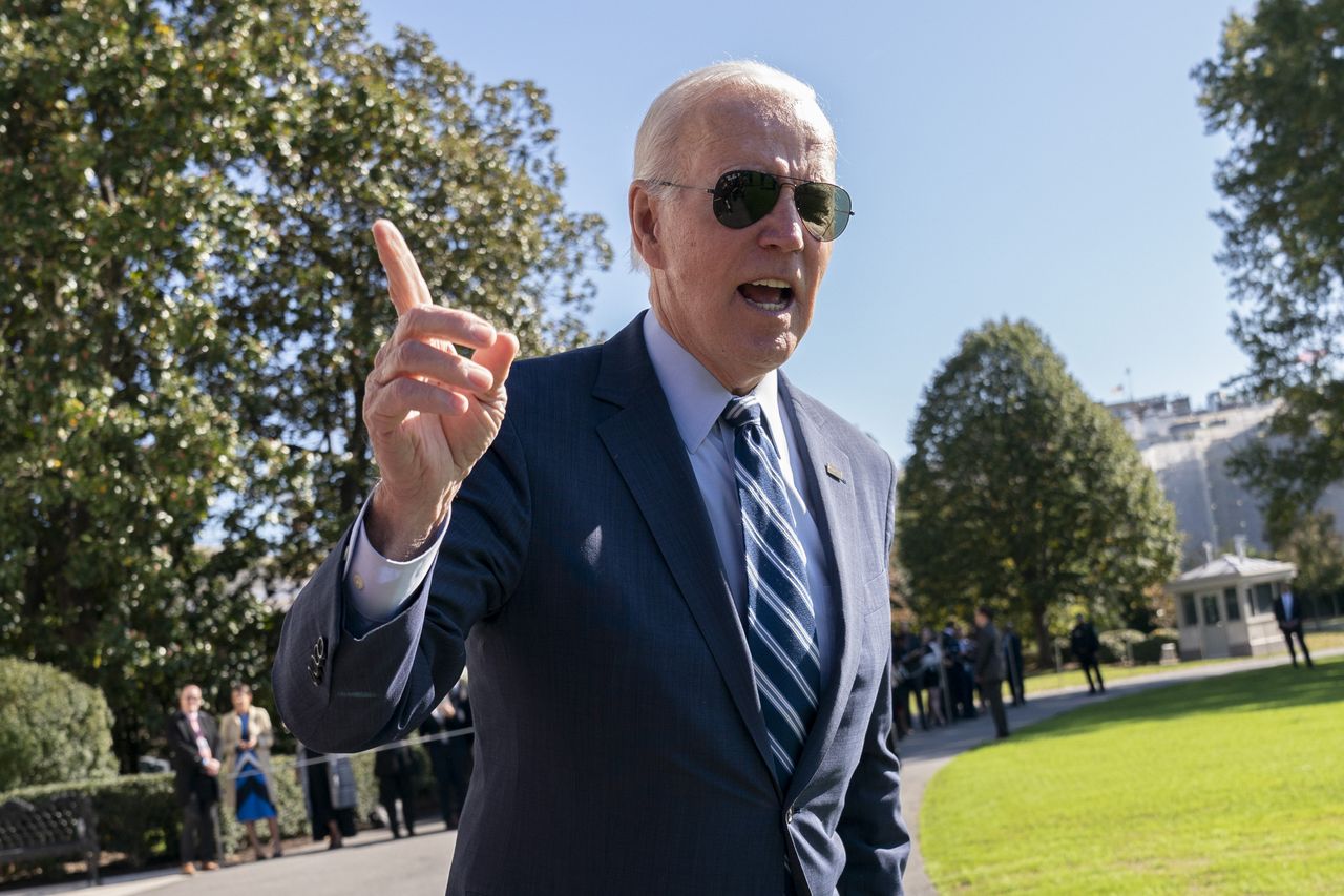 President Biden talks to reporters before boarding Marine One. 