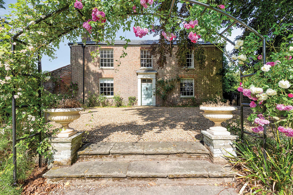 Houses for sale with beautiful fireplaces: Newton House, Newton-in-the-Isle, Cambridgeshire.