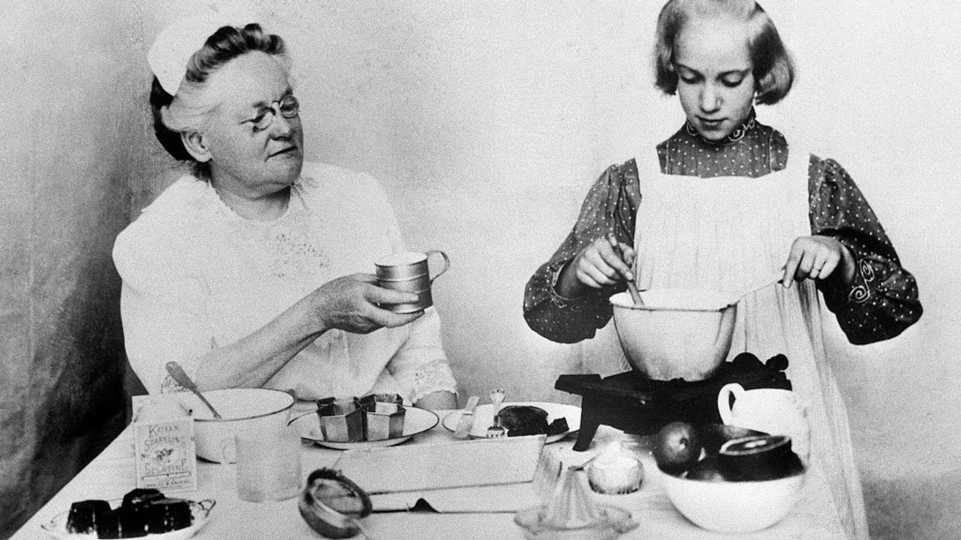 Fannie Farmer teaching a student