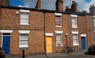 early Victorian terraces with yellow and blue doors and sash windows