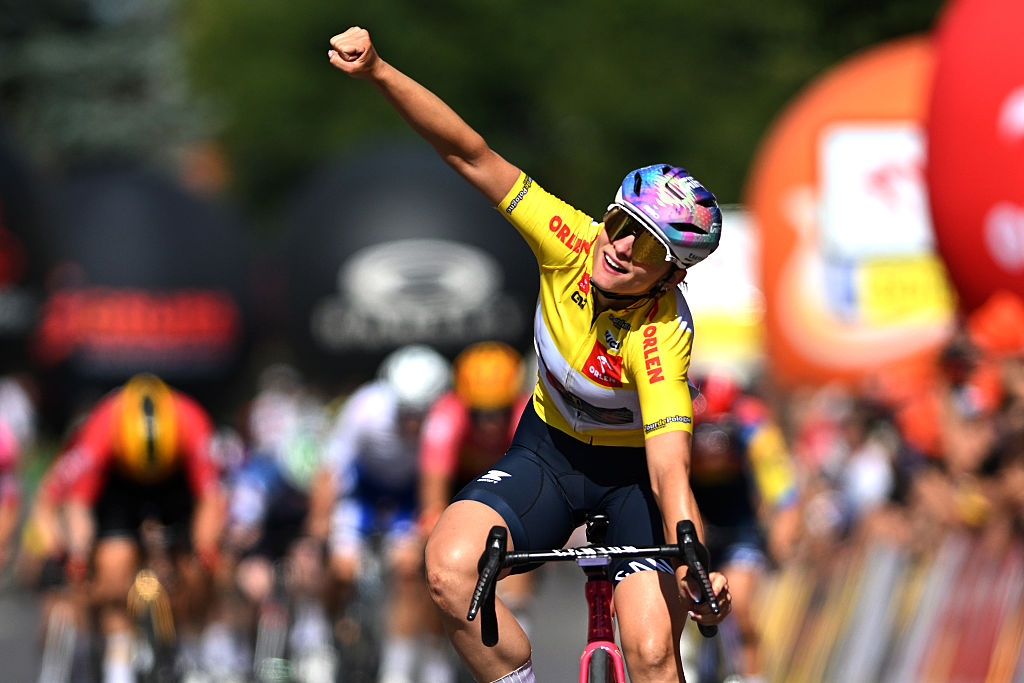 KRASNIK, POLAND - AUGUST 14: Chiara Consonni of Italy and Team CANYON//SRAM zondacrypto -Yellow Leader Jersey celebrates at finish line as overall race and stage winner during the 13th Tour de Pologne Feminin 2025, Stage 3 a 128.2km stage from Naleczow to Krasnik on August 14, 2025 in Krasnik, Poland. (Photo by Szymon Gruchalski/Getty Images)