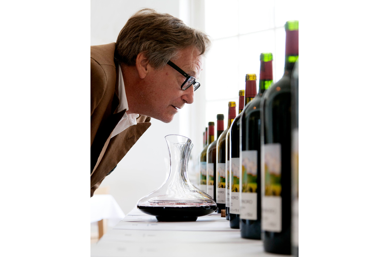 Andrea Franchetti looks at bottles of Tenuta di Trinoro