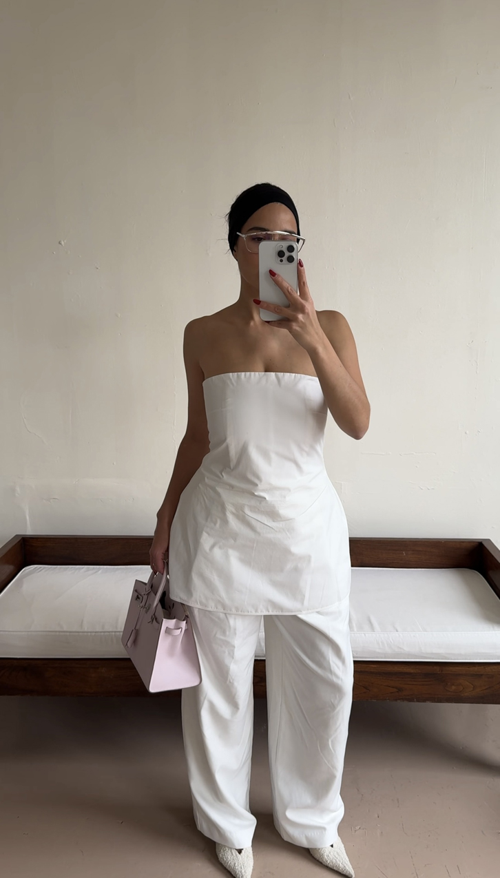 Bettina Looney wearing a strapless Rohe top.