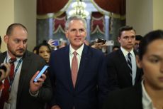 Kevin McCarthy surrounded by reporters and colleagues