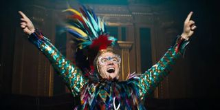Rocketman Elton triumphant in his feathered concert outfit