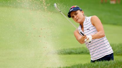Lexi Thompson hits a bunker shot during the 2023 Kroger Queen City Championship on the LPGA Tour
