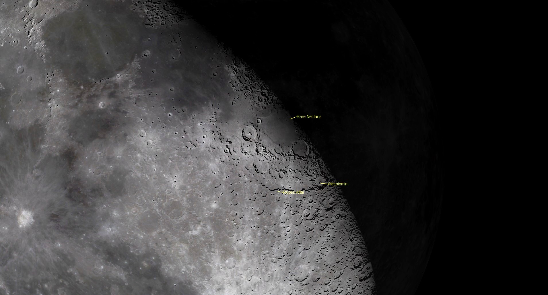 a closeup view of the moon shows craters, indicated with labels