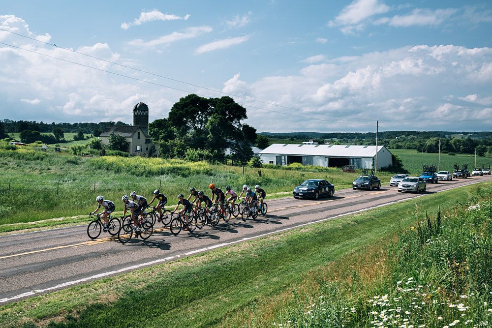 The breakaway rolls through Wisconsin farm country on one of the race's rare flat roads