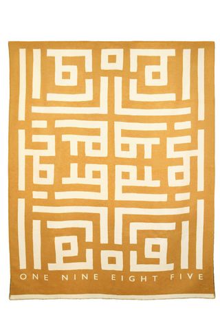 Labyrinth throw in Gold, £165, One Nine Eight Five at Amara