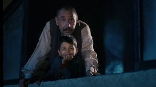 An old cinema projectionist and a young boy bond in Cinema Paradiso