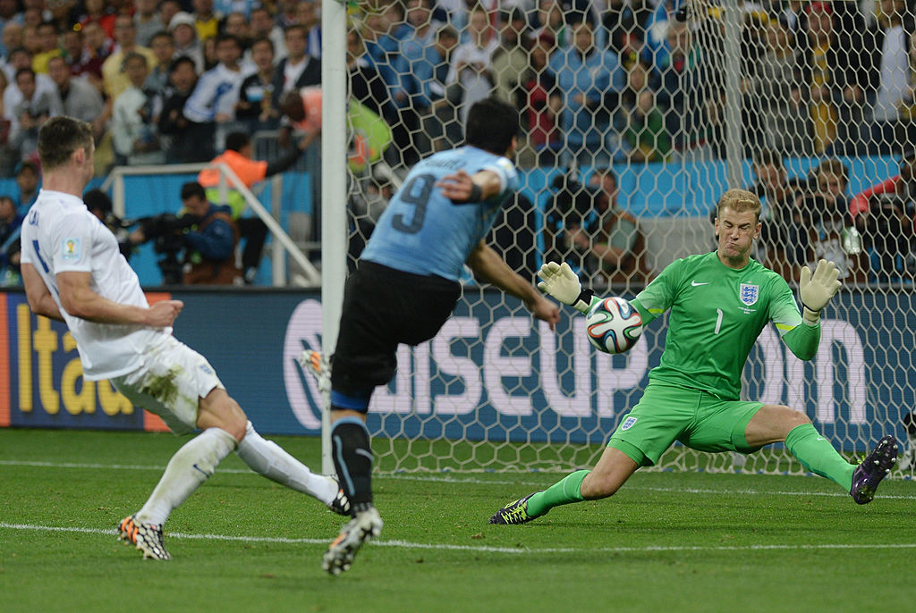 Luis Suarez scores against England in 2014