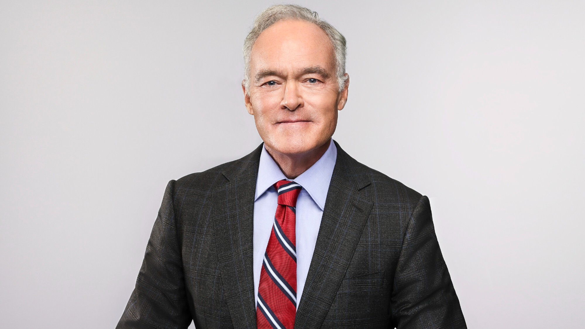A headshot of Scott Pelley from 60 Minutes.