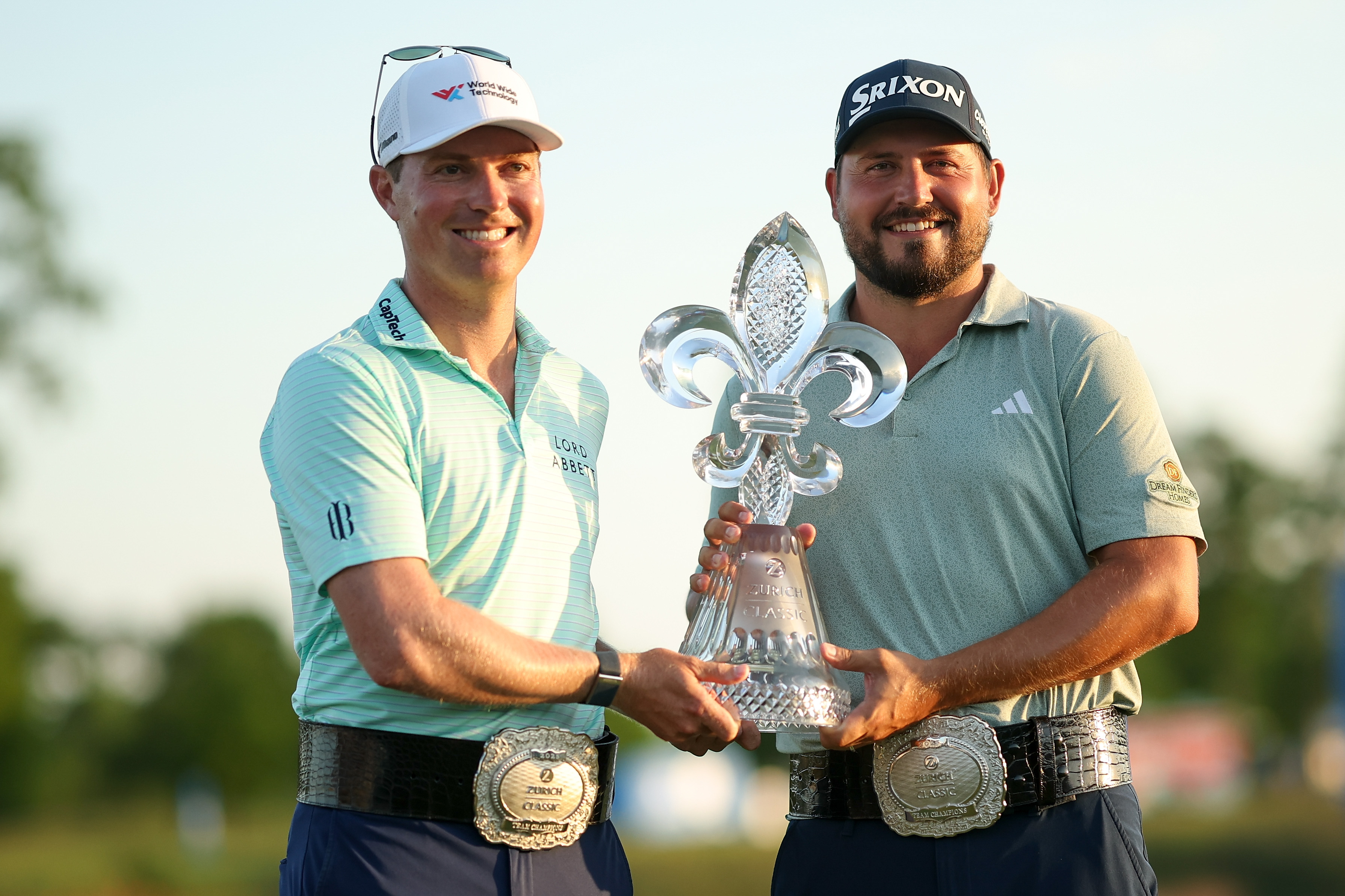 Ben Griffin and Andrew Novak hold a trophy