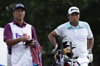 Hideki Matsuyama and caddie Taiga Tabuchi