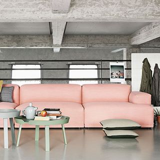 living room with muuto connect rose sofa cushions and coffee table