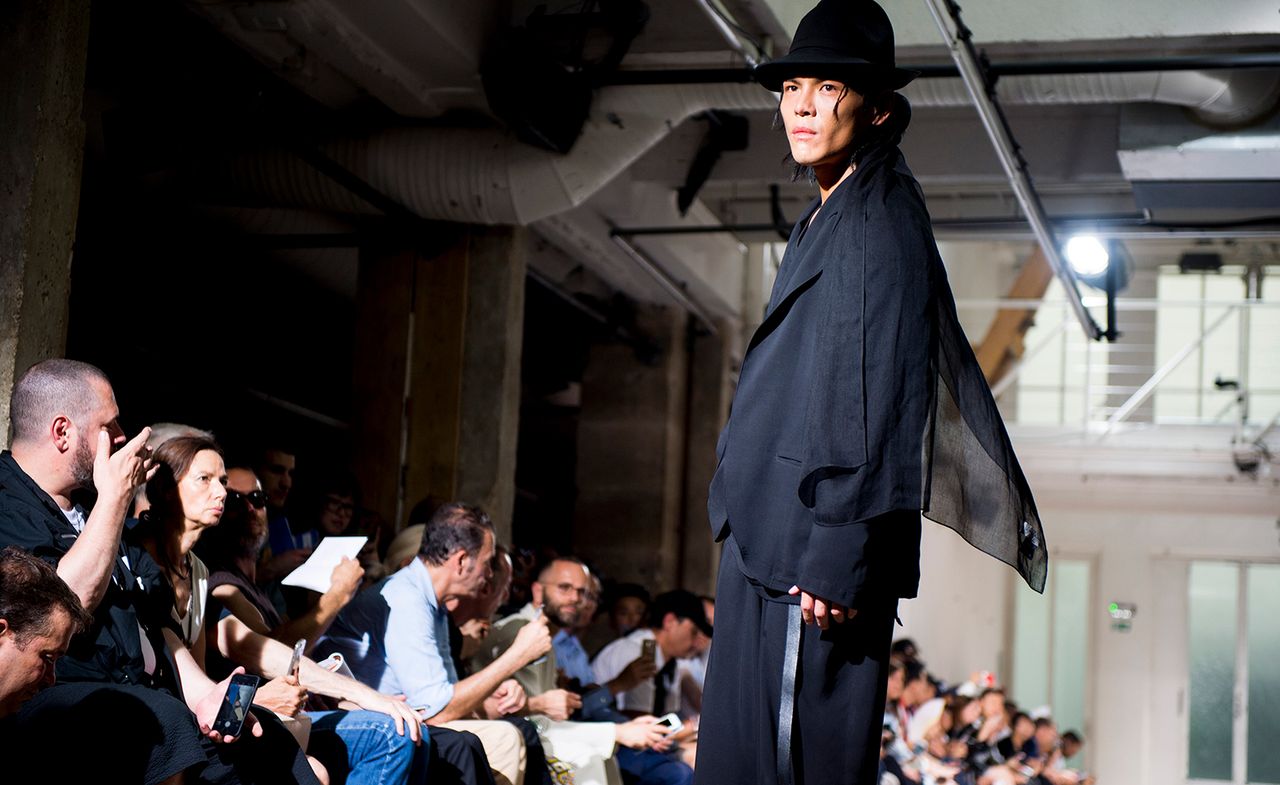 Male model at Paris fashion week wearing Yohji Yamamoto clothes