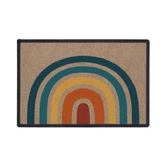 A rainbow patterned door mat
