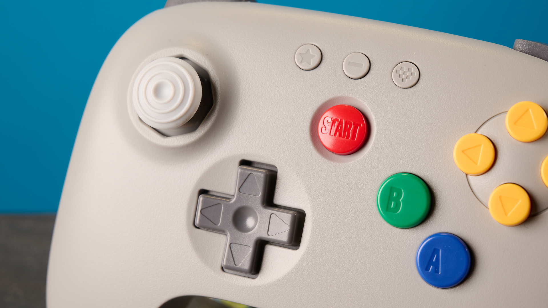 The 8BitDo 64 Controller against a blue background