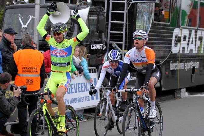 Simone Ponzi (Yellow Fluo) celebrates his win in the Dwars door Drenthe