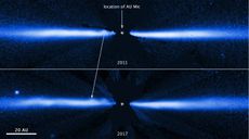 Hubble Space Telescope images of the debris disk surrounding a star called AU Microscopii show the same structure migrating outward.