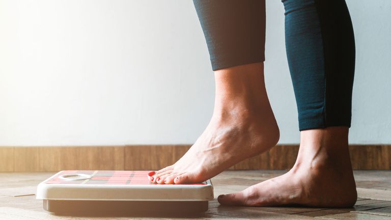What is keto? Image shows person on weighing scales