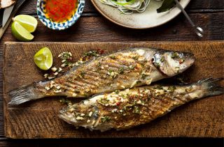 Grilled sea bass with Greek dressing