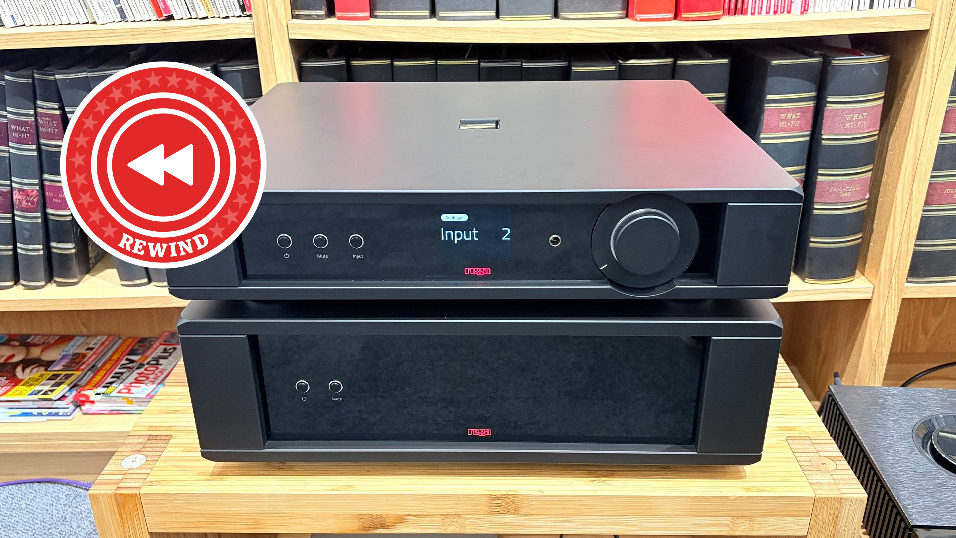 Rega amp on stand with Rewind logo