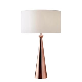 A copper based lamp with a white lampshade