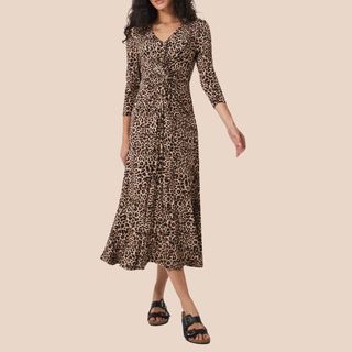 Flat lay image of woman wearing leopard print dress