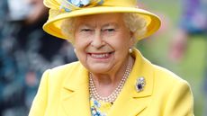 Queen Elizabeth II watches her horse 'Fabricate' run in the Wolferton Stakes on day 1 of Royal Ascot at Ascot Racecourse on June 19, 2018 