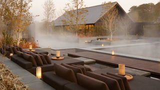 Shot of the outdoor onsen baths and day beds at the Amanemu spa