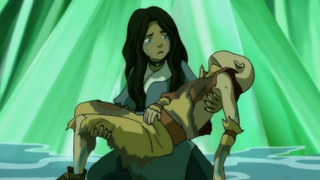 Katara holding Aang in Avatar: The Last Airbender.