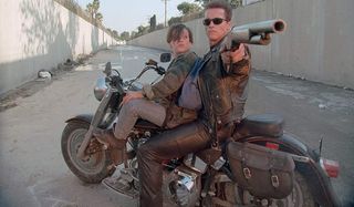 Terminator 2: Judgement Day Arnold Schwarzenegger aims his shotgun at the screen