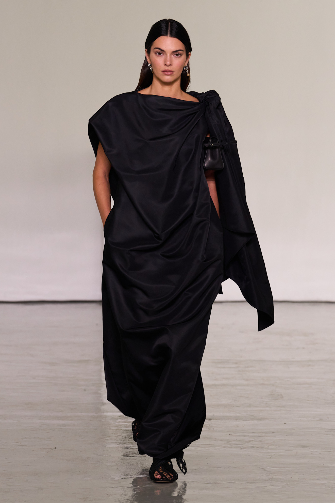 Kendall Jenner walking in the spring/summer 2027 Bottega Veneta show during Milan Fashion Week.
