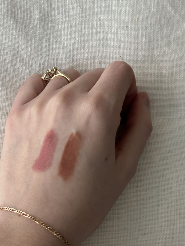 Deputy beauty editor Grace Lindsay swatching Victoria Beckham's go-to lip combo on the back of her hand