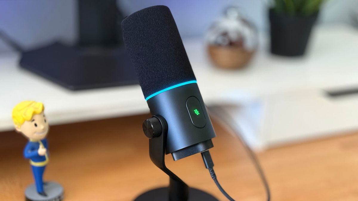 Razer Seiren V3 Pro microphone on wooden desk